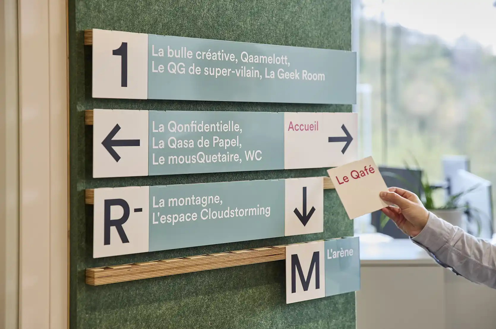 QoQa wayfinding by Studio Banana